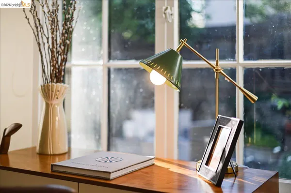 a workspace with furniture and a window