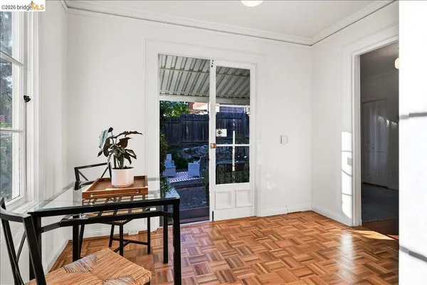 a view of a dining room with furniture window and outside view