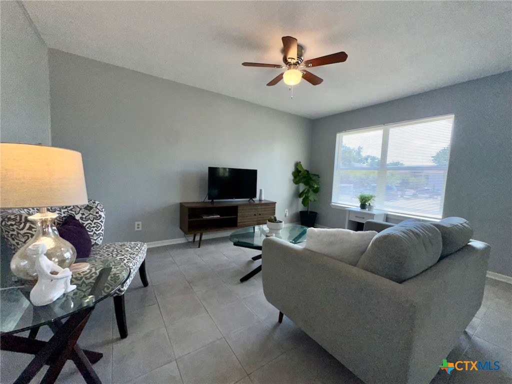 2918 Antelope Trail Temple, TX 76504 - Photo 13 of 24 a living room with furniture and a large window