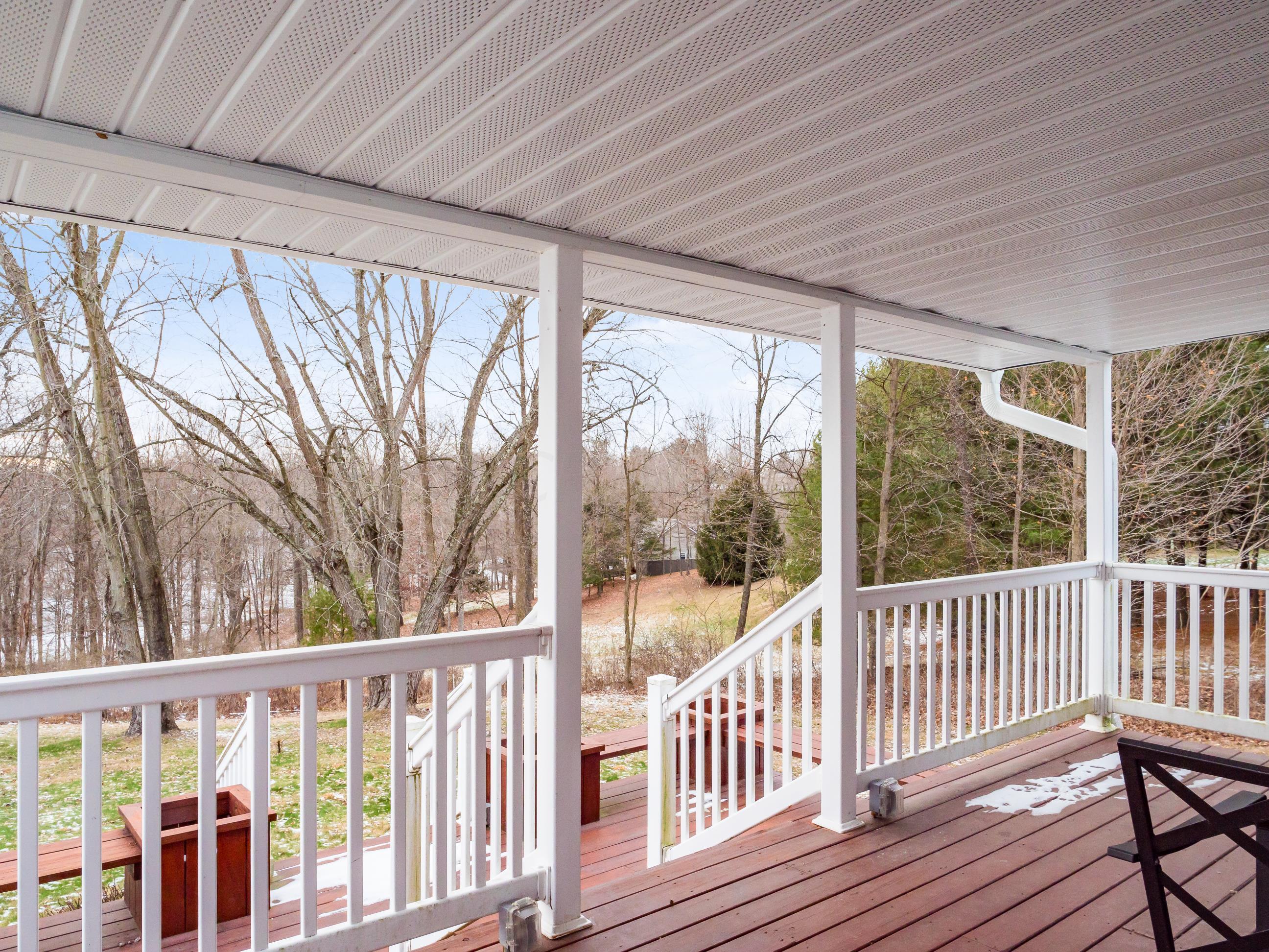 8090 Ridge Road Zanesville, OH 43701 - Photo 21 of 28 8090 Ridge Rd covered back porch