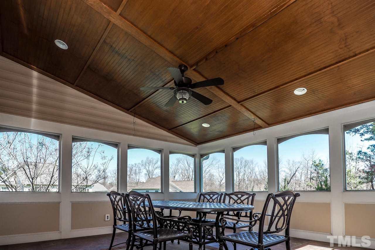 11737 Dellcain Court Raleigh, NC 27617 - Photo 16 of 26 Relax in the evenings on your screened in deck or out on the deck.