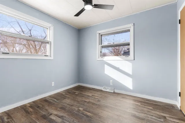 a white toilet sitting next to a bathroom sink