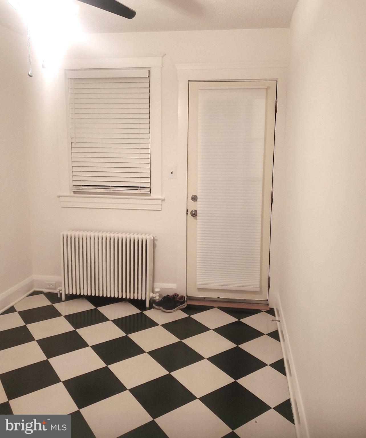 8000 Harford Road Parkville, MD 21234 - Photo 16 of 20 a black and white checkered floor