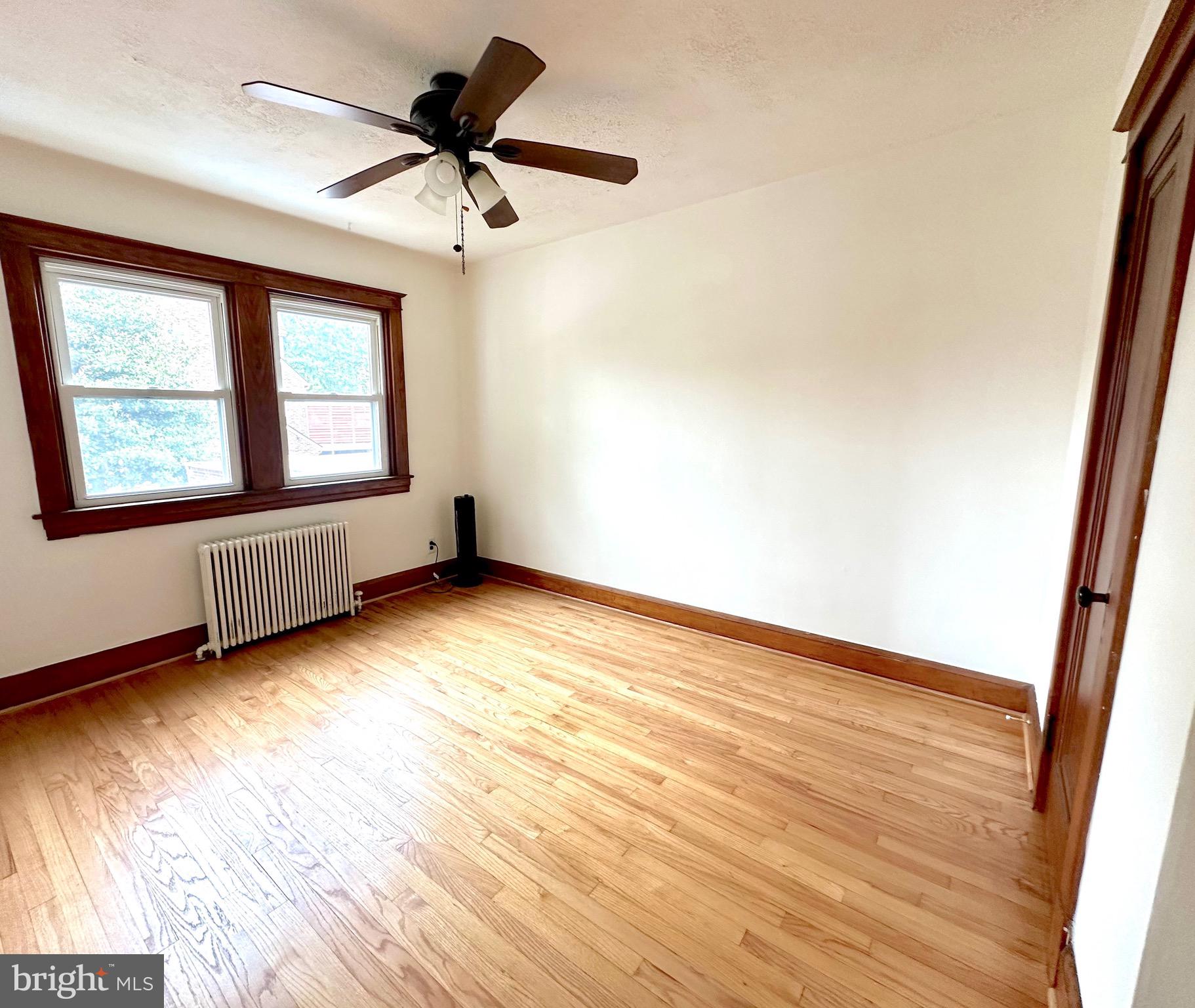 8000 Harford Road Parkville, MD 21234 - Photo 6 of 20 a view of an empty room and window