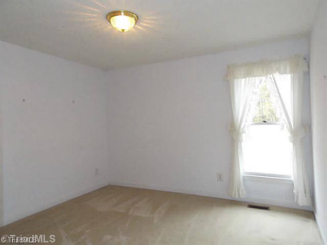 3768 Osceola Road Elon, NC 27244 - Photo 12 of 16 3rd Bedroom.