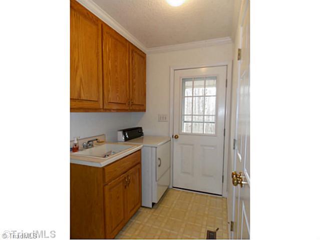 3768 Osceola Road Elon, NC 27244 - Photo 13 of 16 Laundry Room.