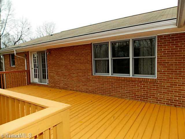 3768 Osceola Road Elon, NC 27244 - Photo 15 of 16 Patio/Deck. Large Deck, Accessible from Master Bedroom and Den