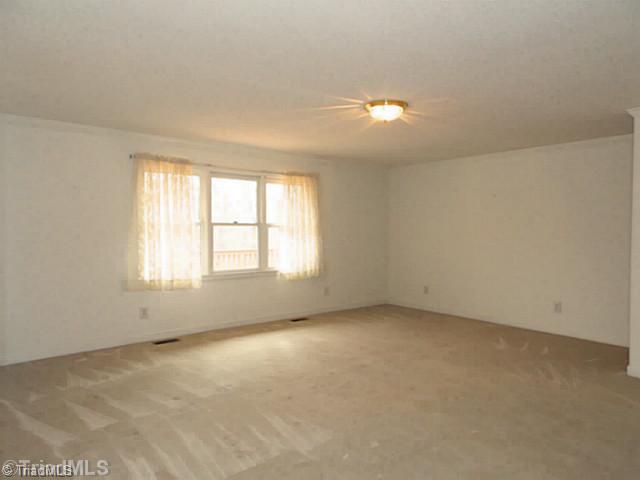 3768 Osceola Road Elon, NC 27244 - Photo 4 of 16 Living Room. Spacious Living Room w/ Ample Lighting