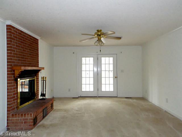 3768 Osceola Road Elon, NC 27244 - Photo 8 of 16 Den/Family/Great Room. Large Den w/ Wood Burning Fireplace