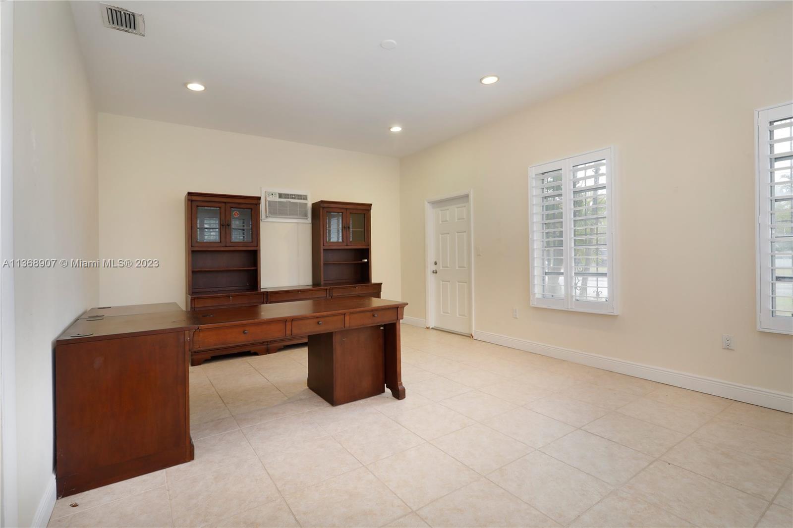 6970 Sunset Drive Miami, FL 33143 - Photo 16 of 30 a room with furniture
