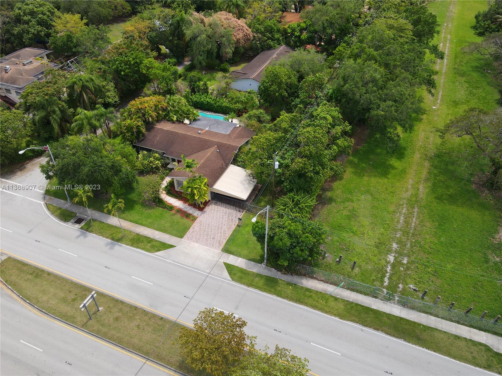 6970 Sunset Drive Miami, FL 33143 - Photo 20 of 30 an aerial view of a house