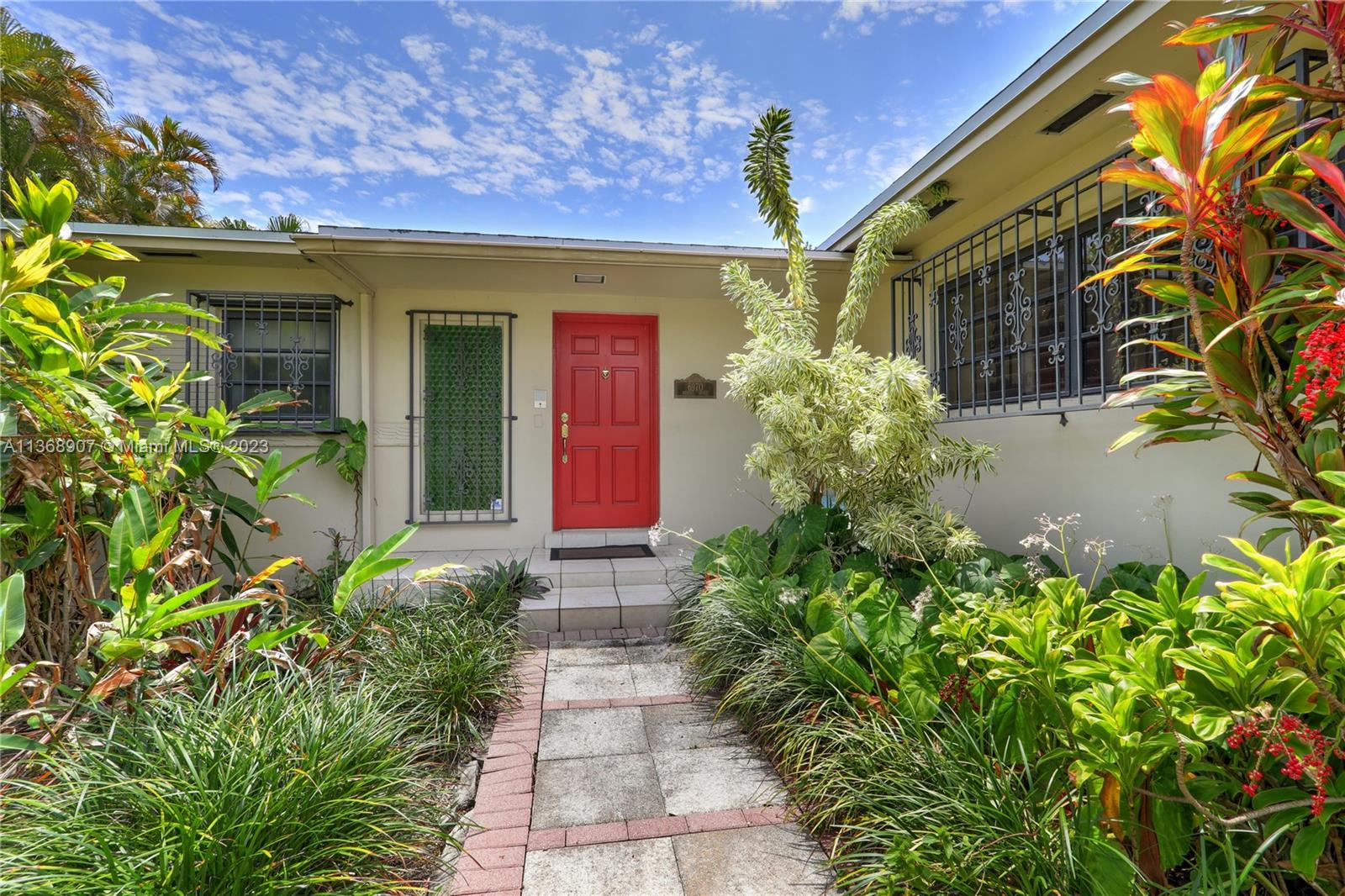 6970 Sunset Drive Miami, FL 33143 - Photo 29 of 30 a view of a house with potted plants