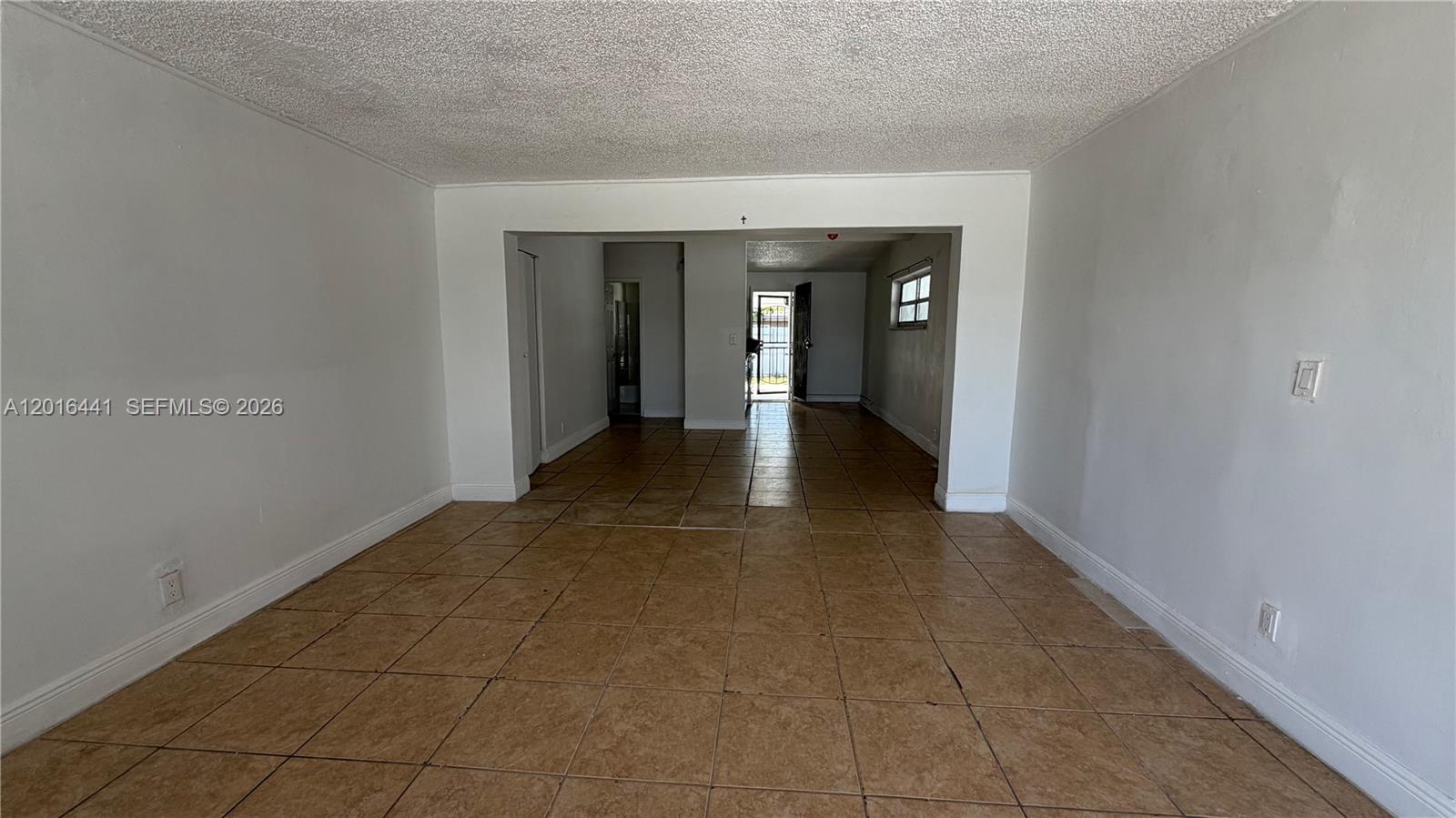 2230 Service Road Opa-Locka, FL 33054 - Photo 5 of 25 a view of a hallway with an empty room