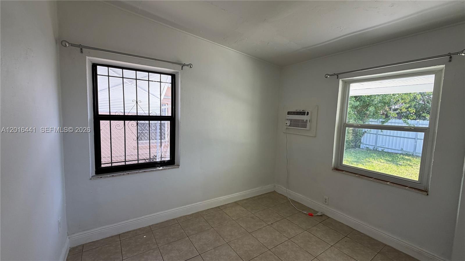 2230 Service Road Opa-Locka, FL 33054 - Photo 10 of 25 an empty room with a window