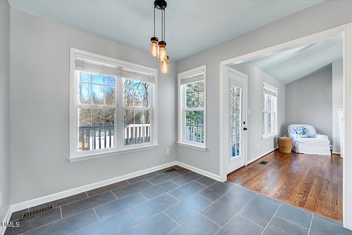 1716 Middle Ridge Drive Willow Spring, NC 27592 - Photo 13 of 41 a view of an empty room with a window