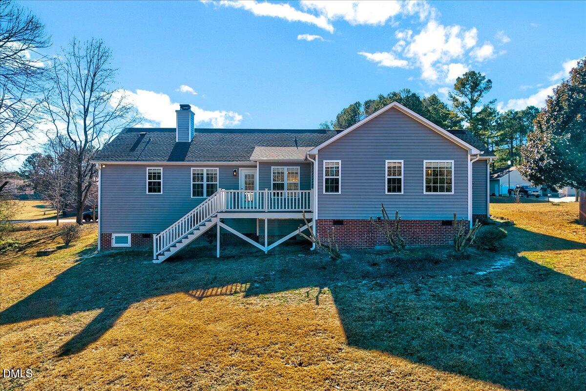 1716 Middle Ridge Drive Willow Spring, NC 27592 - Photo 28 of 41 a view of a house with a yard