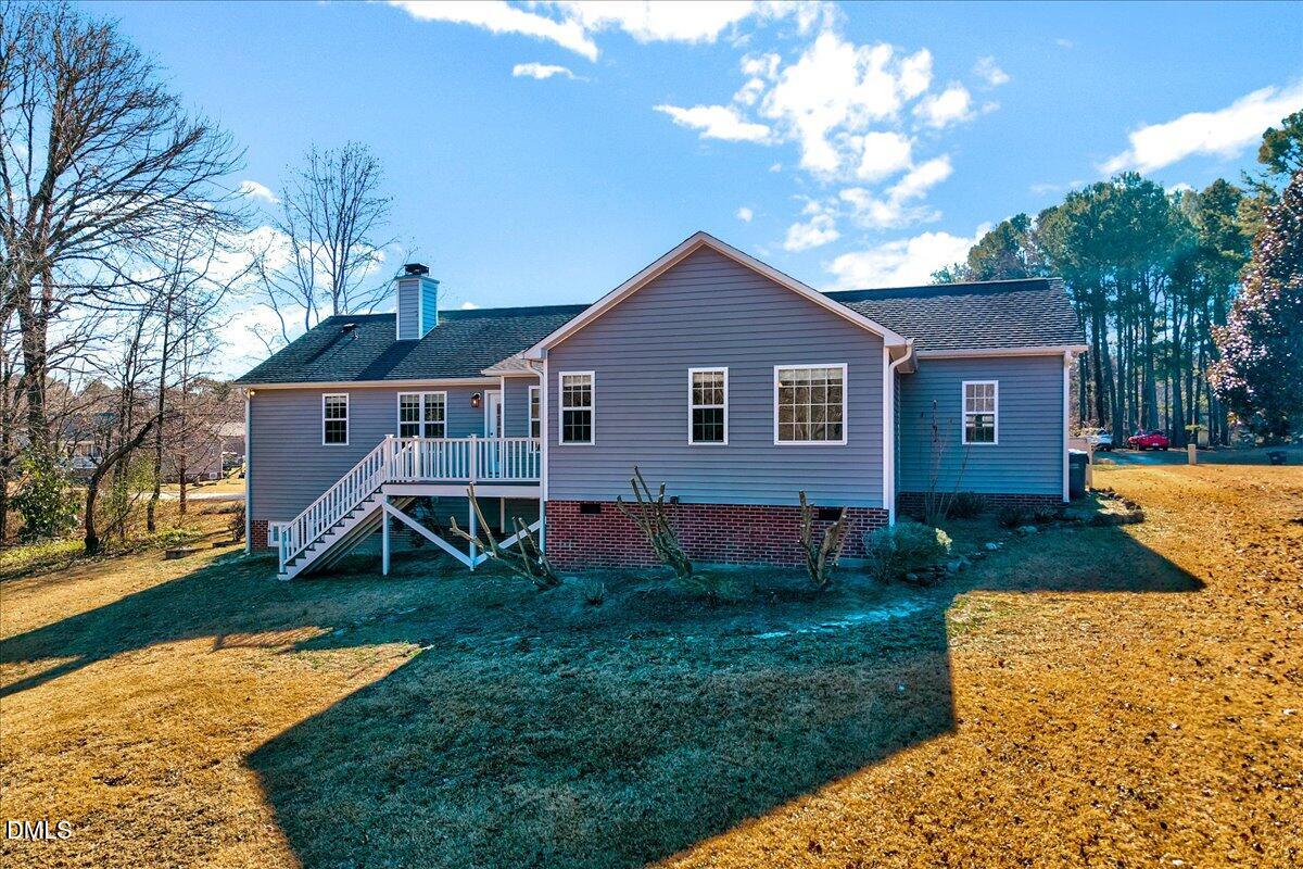 1716 Middle Ridge Drive Willow Spring, NC 27592 - Photo 29 of 41 a view of a house with a yard