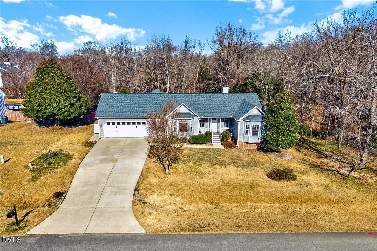 1716 Middle Ridge Drive Willow Spring, NC 27592 - Photo 31 of 41 a view of house with outdoor space