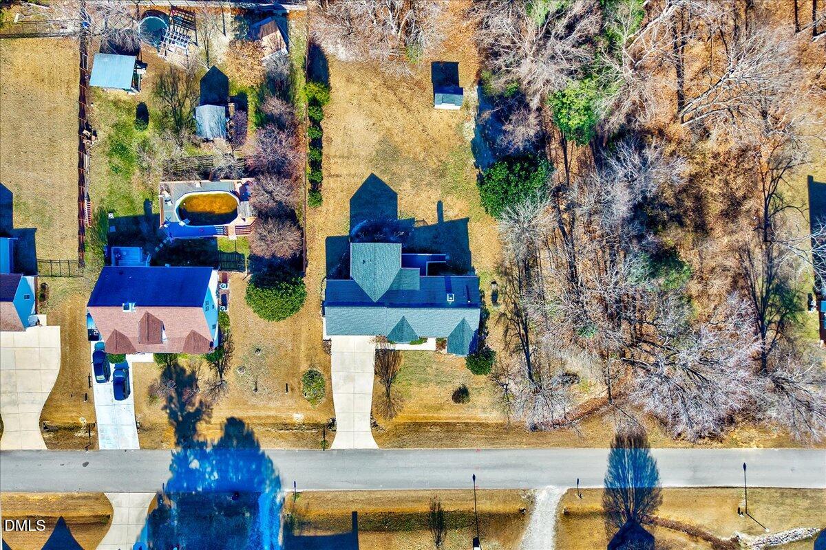 1716 Middle Ridge Drive Willow Spring, NC 27592 - Photo 32 of 41 an aerial view of multiple house
