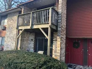 a view of a terrace with sitting area