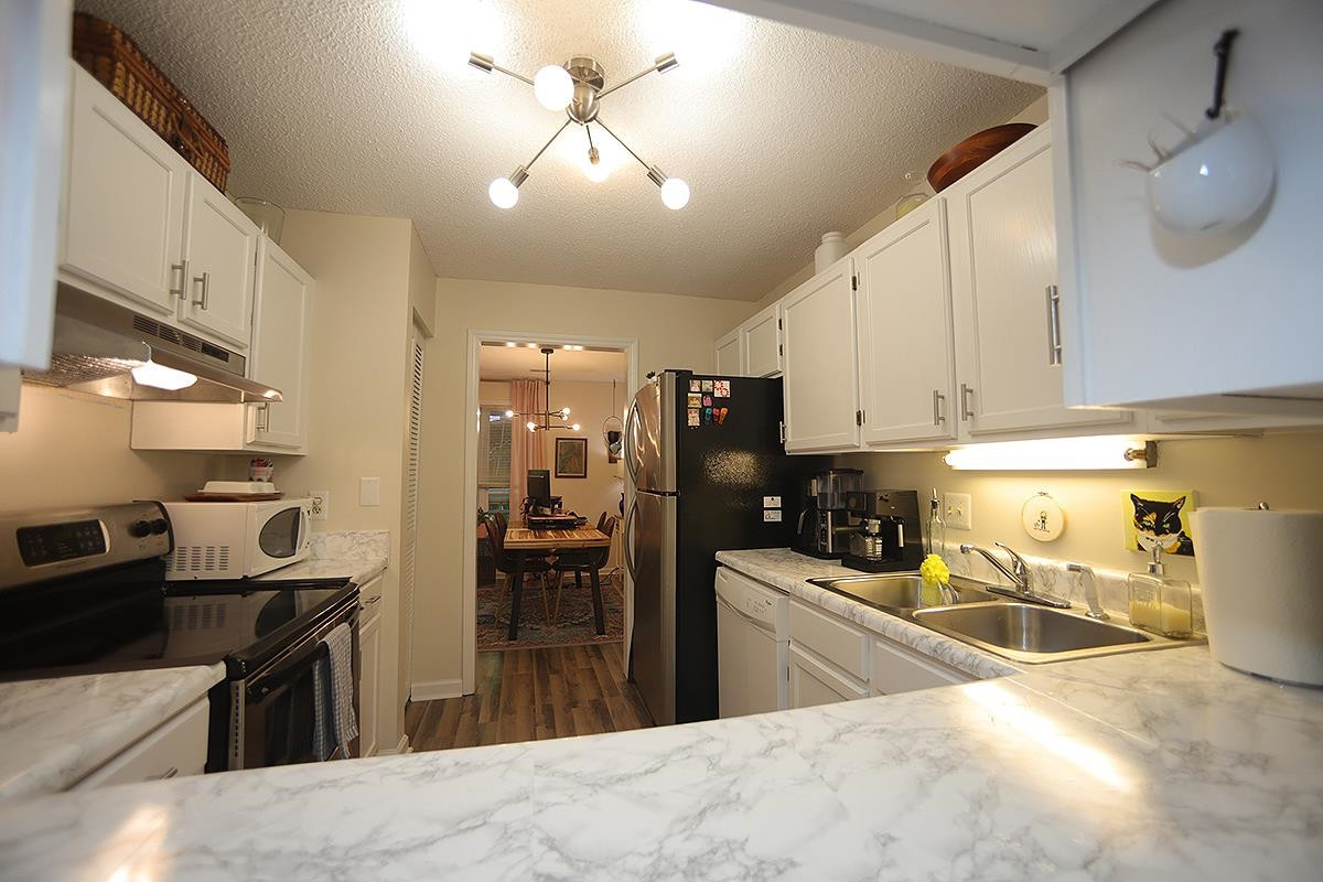 4641 Timbermill Court, Unit 103 Raleigh, NC 27612 - Photo 8 of 19 Photo 9