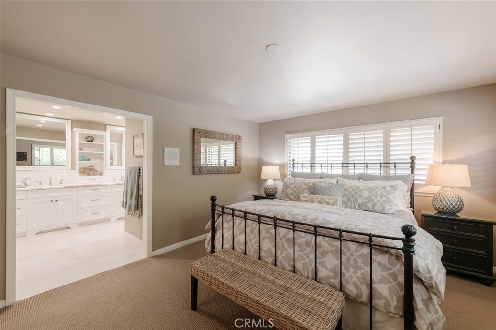 1 Santa Rosa Court Manhattan Beach, CA 90266 - Photo 13 of 28 a bedroom with a bed and wooden floor