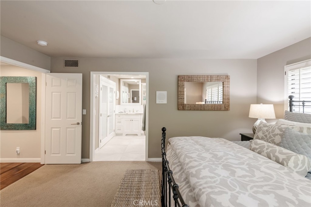 1 Santa Rosa Court Manhattan Beach, CA 90266 - Photo 14 of 28 a bedroom with a bed and a window