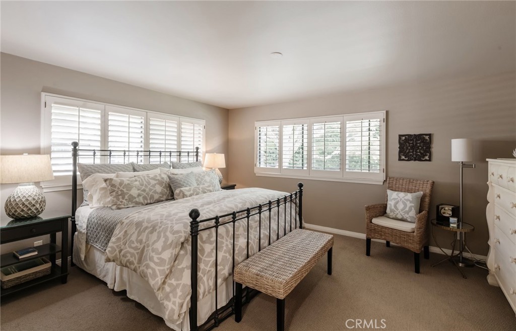 1 Santa Rosa Court Manhattan Beach, CA 90266 - Photo 15 of 28 a bedroom with a bed and a window