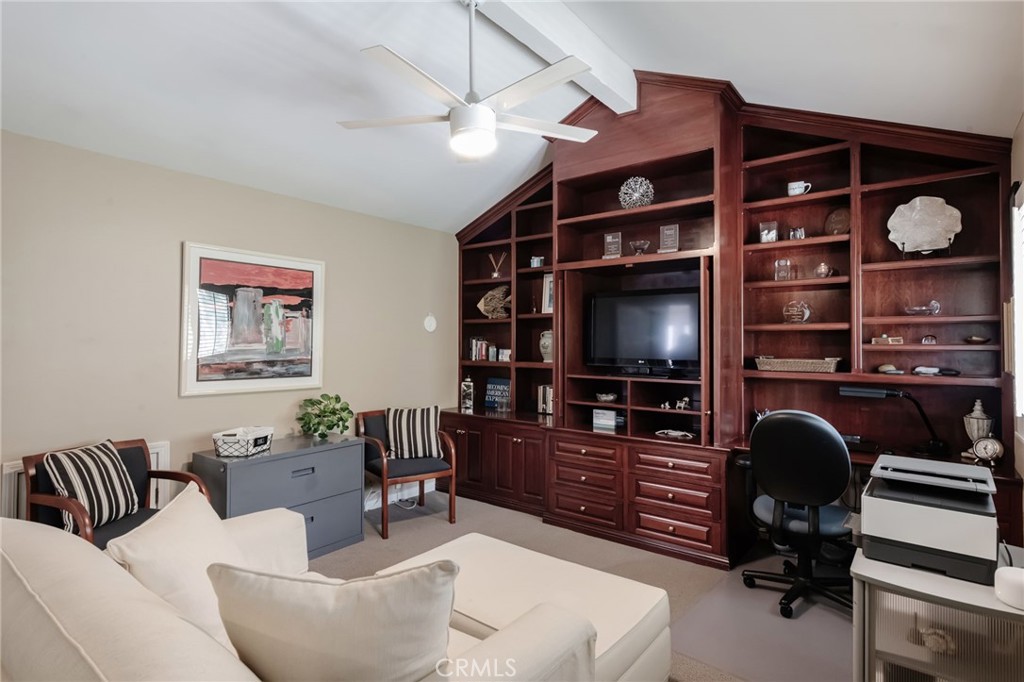 1 Santa Rosa Court Manhattan Beach, CA 90266 - Photo 23 of 28 a living room with furniture and a flat screen tv
