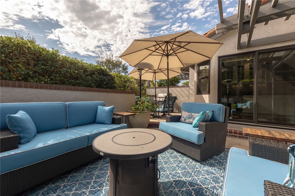 1 Santa Rosa Court Manhattan Beach, CA 90266 - Photo 25 of 28 a view of a patio with couches table and chairs