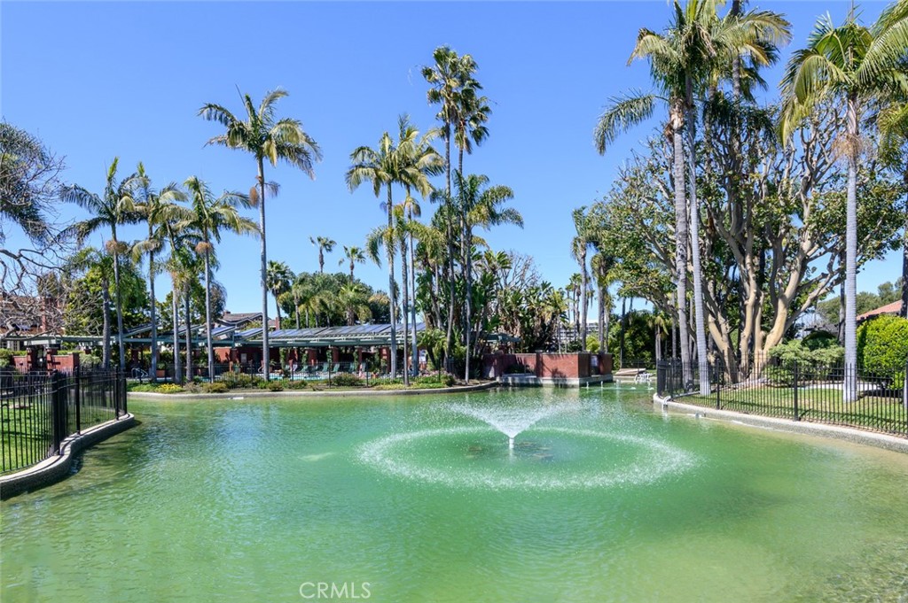 1 Santa Rosa Court Manhattan Beach, CA 90266 - Photo 27 of 28 a view of a swimming pool with a table and chairs