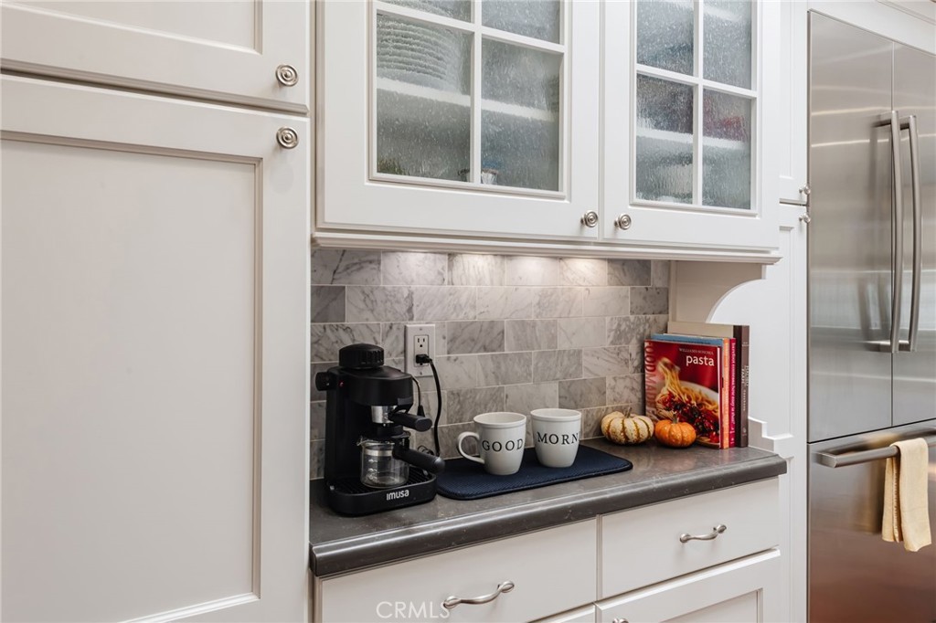 1 Santa Rosa Court Manhattan Beach, CA 90266 - Photo 9 of 28 a kitchen with a refrigerator and window