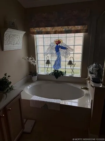 a room with a sink and a window