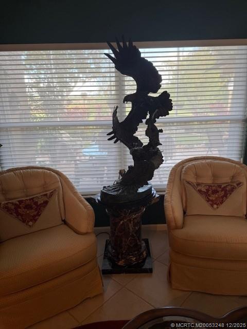 6948 Southeast Twin Oaks Circle Stuart, FL 34997 - Photo 9 of 24 a living room with furniture