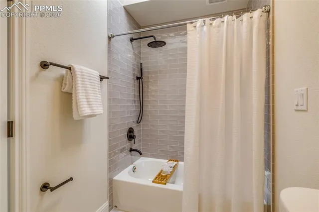 a view of balcony with wooden floor