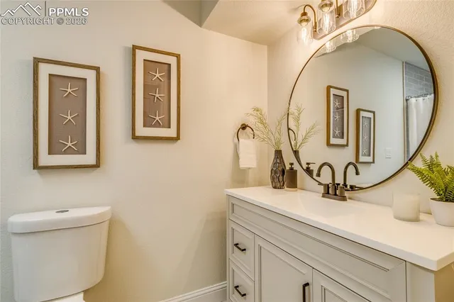 a view of a room with a hallway