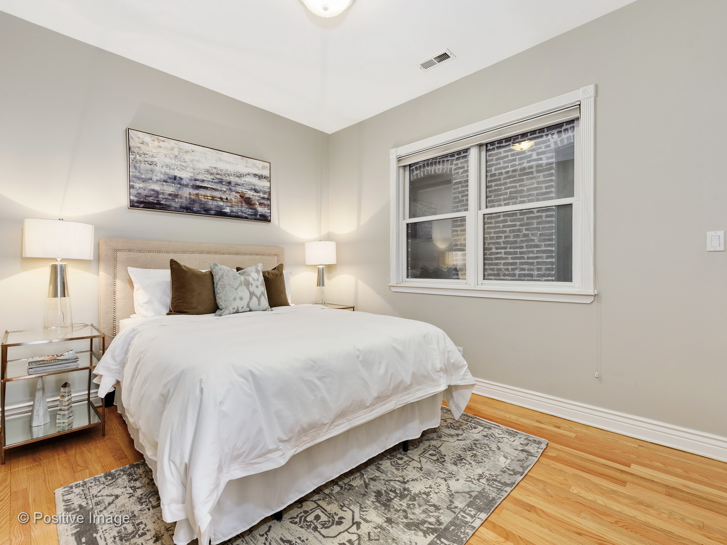 1908 North Sheffield Avenue, Unit 2 Chicago, IL 60614 - Photo 14 of 17 a bedroom with a bed and a window