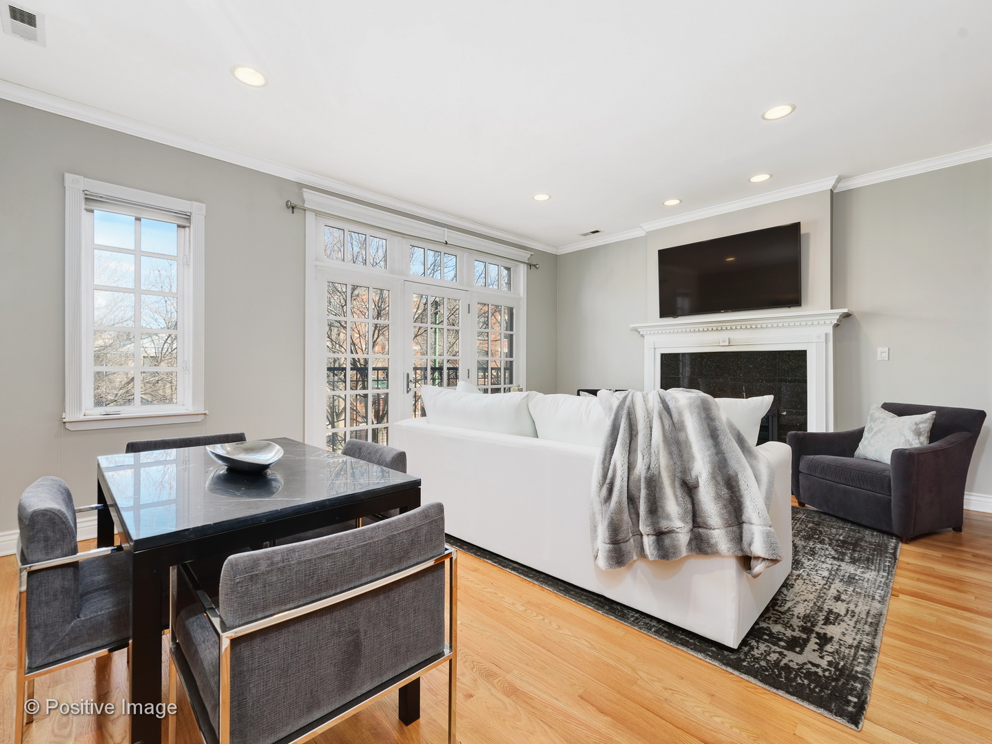 1908 North Sheffield Avenue, Unit 2 Chicago, IL 60614 - Photo 6 of 17 a living room with furniture and a flat screen tv