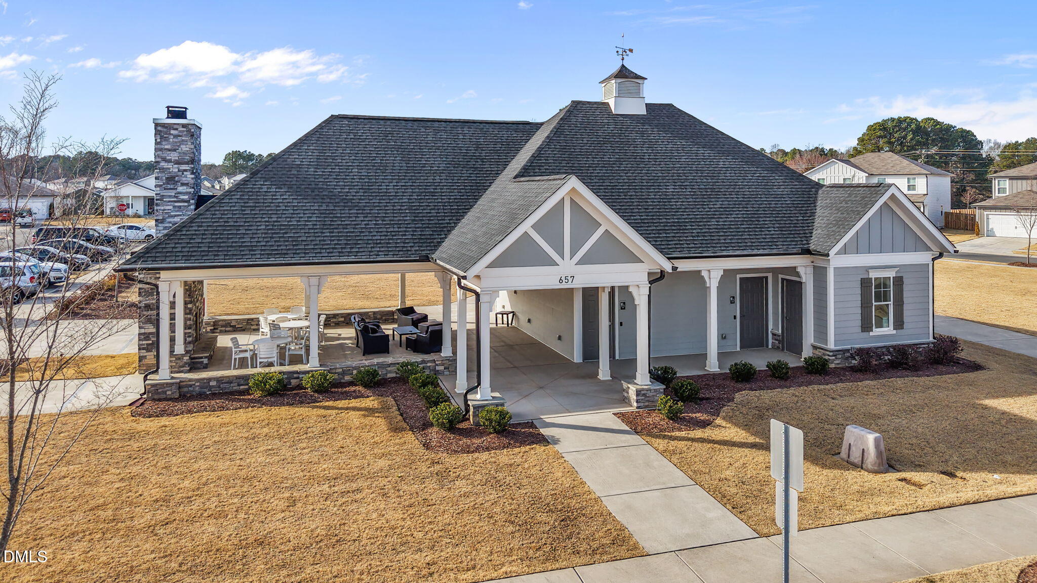 1572 Rhodes Pond Street Wendell, NC 27591 - Photo 29 of 44 a front view of house with yard outdoor seating and barbeque oven
