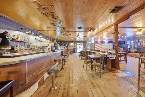 a view of a house with backyard