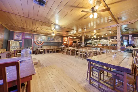 a backyard of a house with seating space