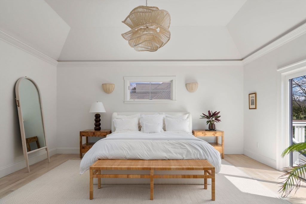 11 Fisher Avenue Wellesley, MA 02482 - Photo 15 of 35 a bedroom with a bed and a mirror