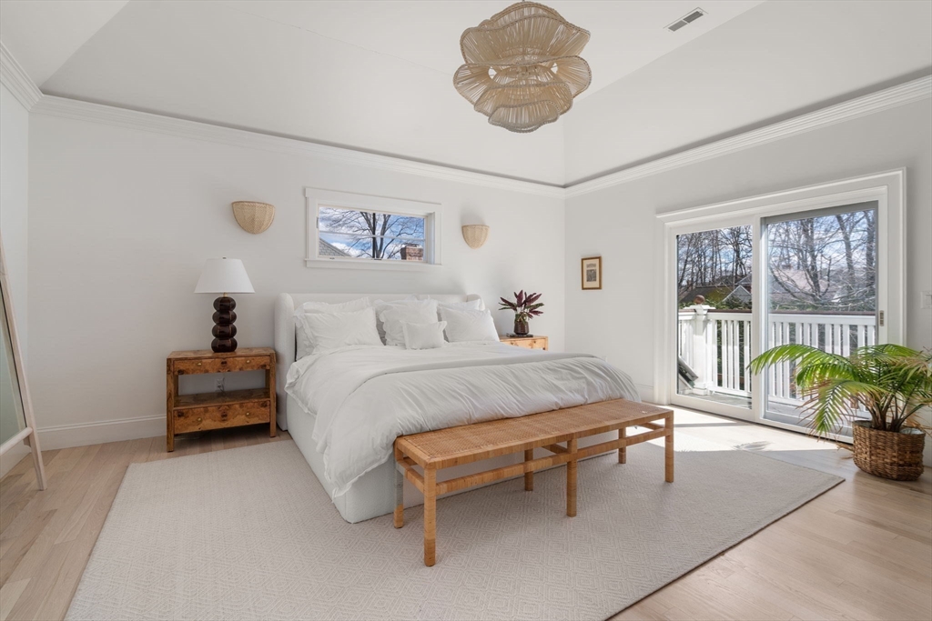 11 Fisher Avenue Wellesley, MA 02482 - Photo 16 of 35 a bedroom with a bed and a chandelier