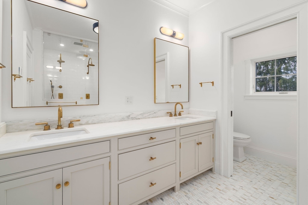11 Fisher Avenue Wellesley, MA 02482 - Photo 17 of 35 a bathroom with double sink and a mirror