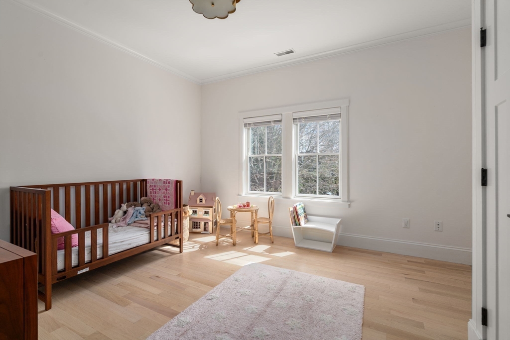 11 Fisher Avenue Wellesley, MA 02482 - Photo 20 of 35 a living room with a large window