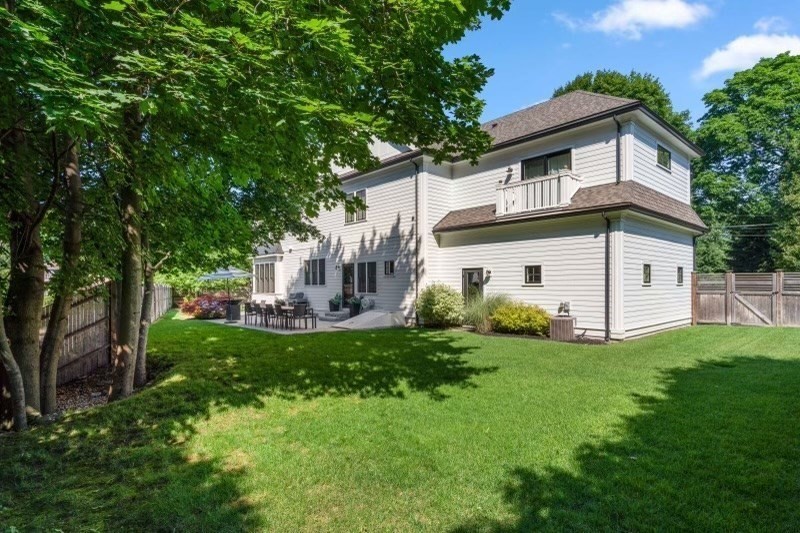 11 Fisher Avenue Wellesley, MA 02482 - Photo 2 of 35 a view of a white house in front of a big yard with large trees