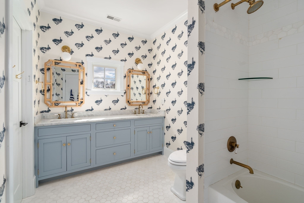 11 Fisher Avenue Wellesley, MA 02482 - Photo 21 of 35 a bathroom with a toilet sink and mirror