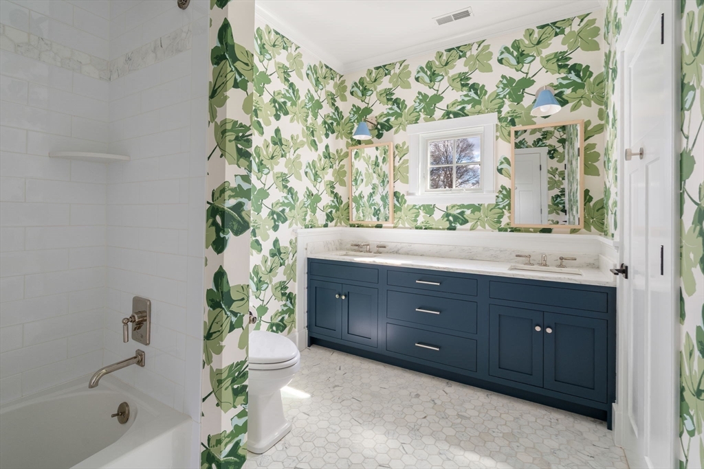 11 Fisher Avenue Wellesley, MA 02482 - Photo 23 of 35 a bathroom with a granite countertop sink and a mirror