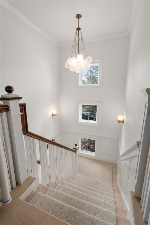 11 Fisher Avenue Wellesley, MA 02482 - Photo 27 of 35 a view of a hallway with wooden floor and staircase