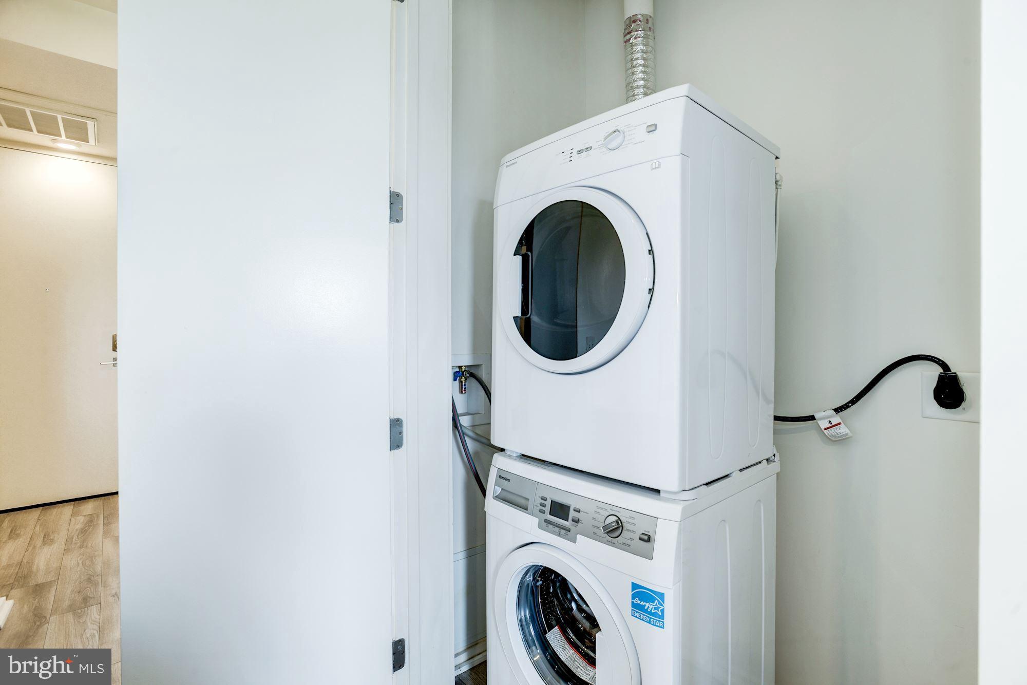 1550 11th Street Northwest, Unit 307 Washington, DC 20005 - Photo 17 of 22 a utility room with dryer and washer